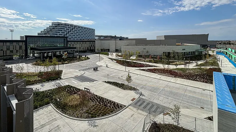 Great Canadian Casino Resort Toronto from above: the stepped hotel tower and the casino building behind landscaped grounds, 2023